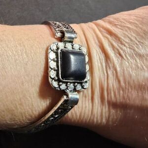 Silver tone black semiprecious stone bracelet up to 8.25"
